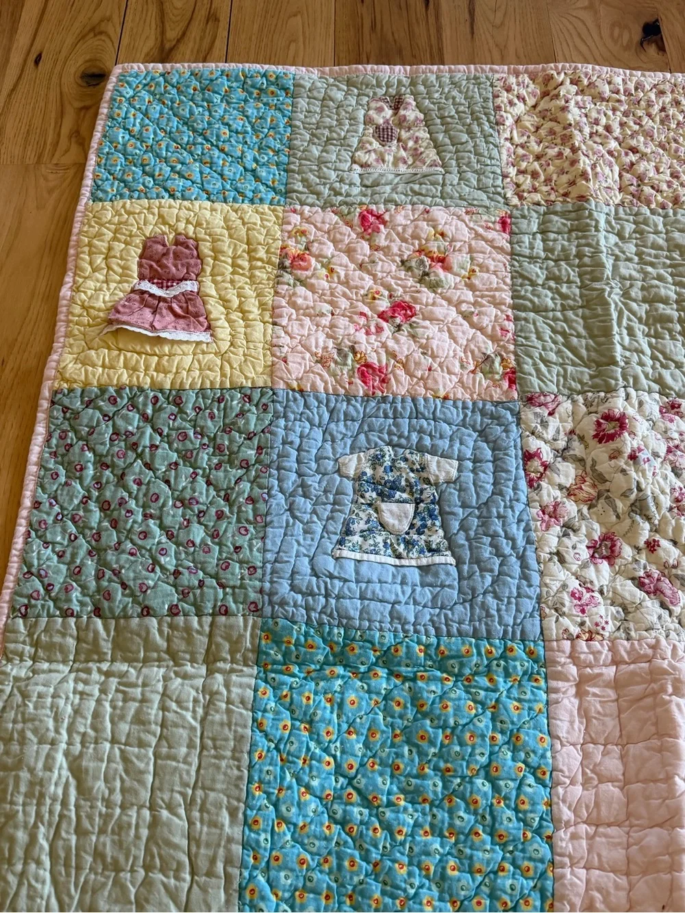 Land Of Nod Patchwork Baby Quilt in Pastel Blue, Pink, Yellow, Cream